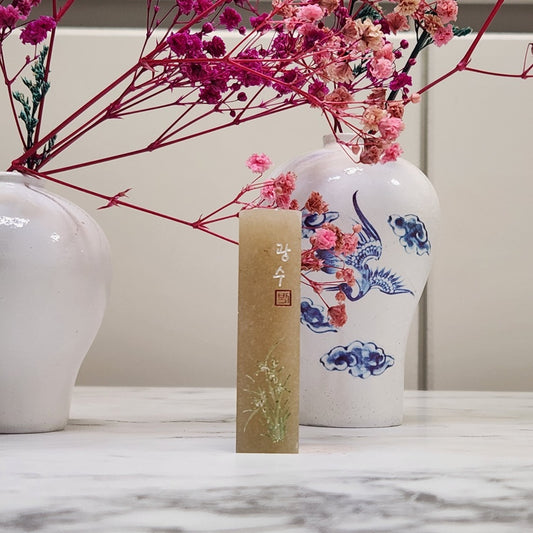 The Orchid Seal: Timeless Grace in Stone