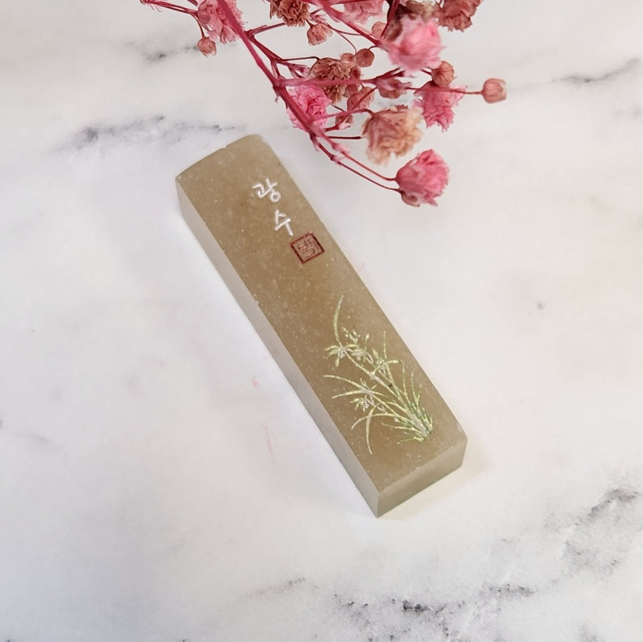 The Orchid Seal: Timeless Grace in Stone