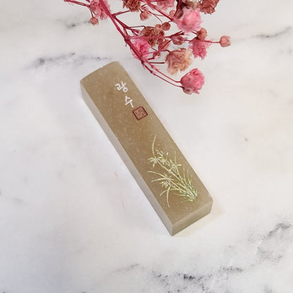 The Orchid Seal: Timeless Grace in Stone